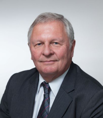 Portrait photo of Judge L J Newhook.